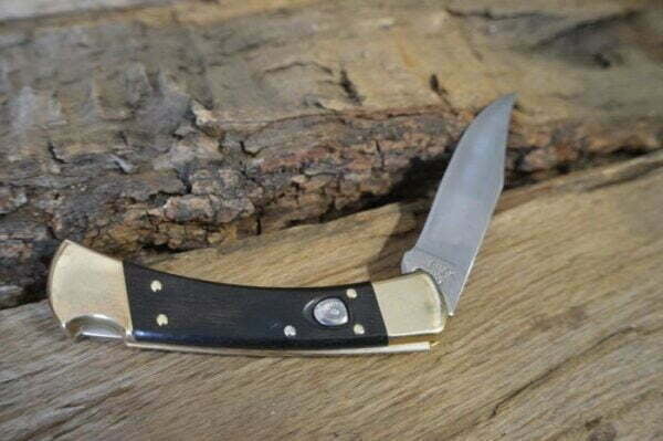 Buck 110 Ebony Wood knives for sale